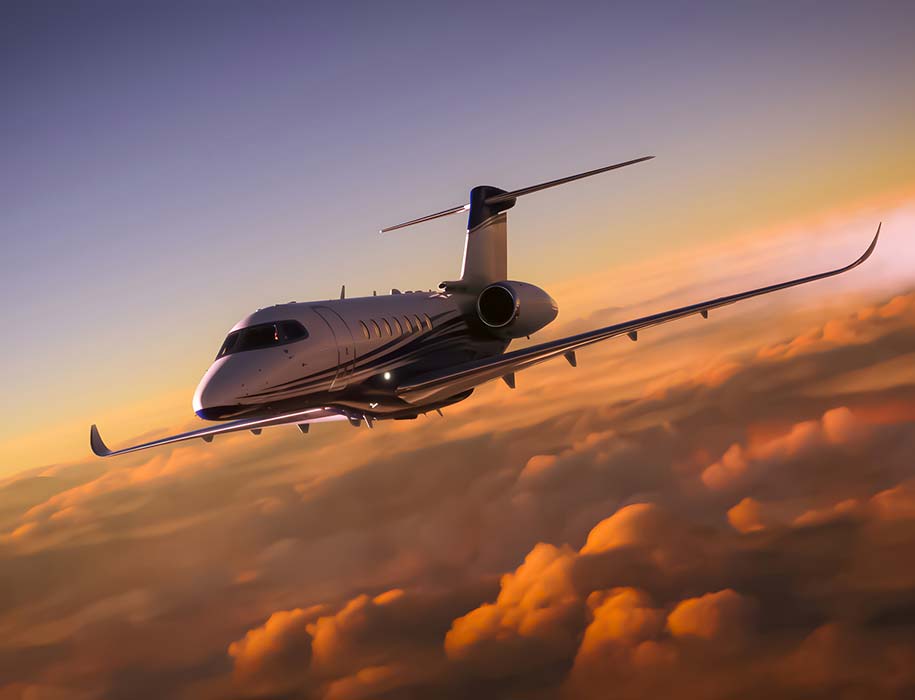 A private jet flying over clouds during a sunset